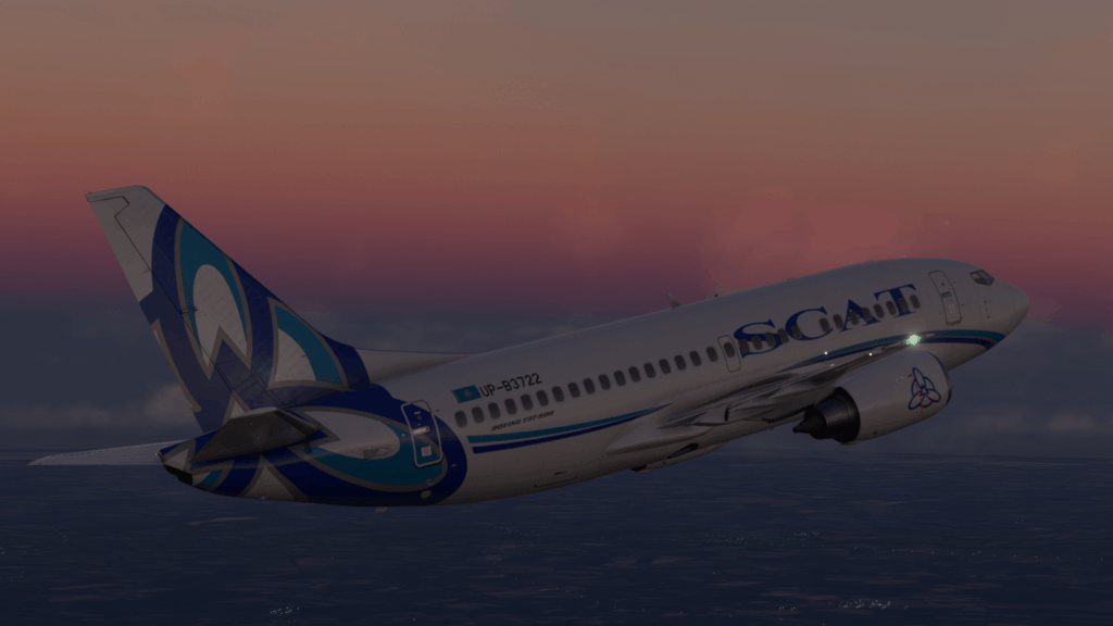 737-500 volant au coucher du soleil