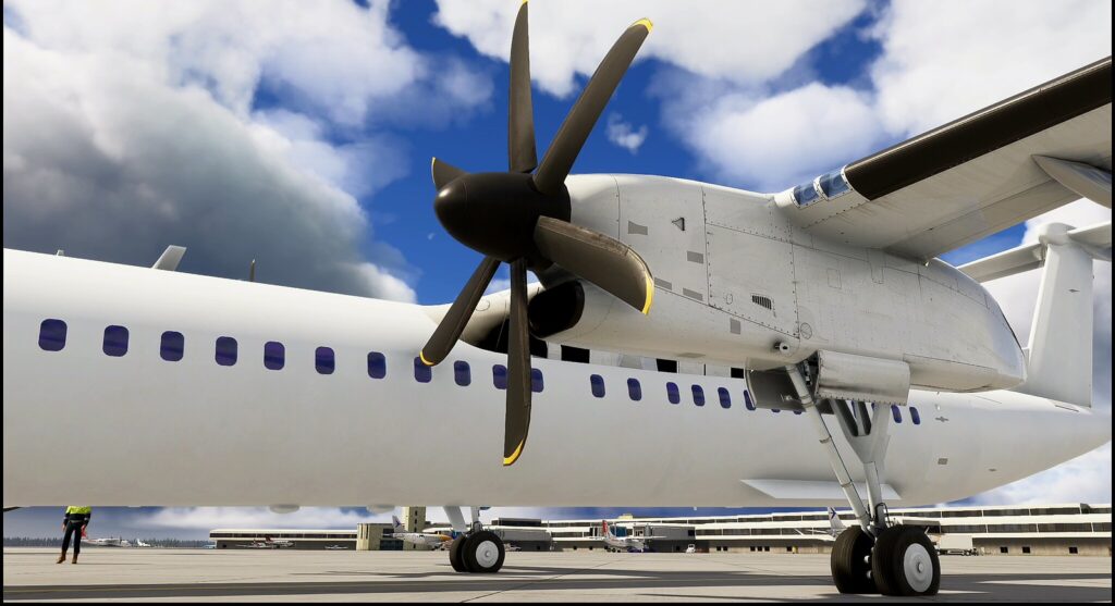 Vue rapprochée du turbopropulseur et de l'hélice du Majestic Dash 8 Q400 dans Microsoft Flight Simulator