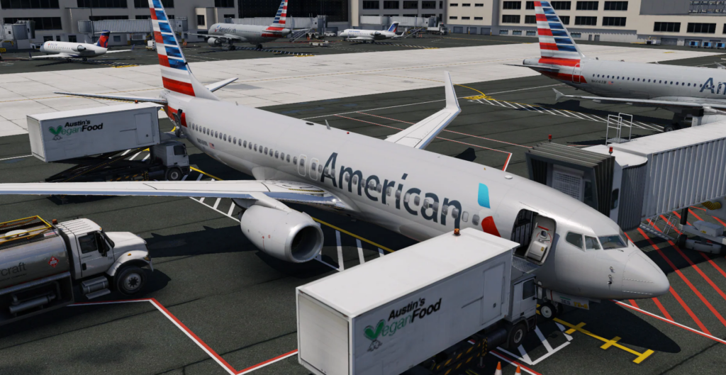 Zibo Boeing 737-800 American à la porte de l'aéroport dans X-Plane avec services au sol