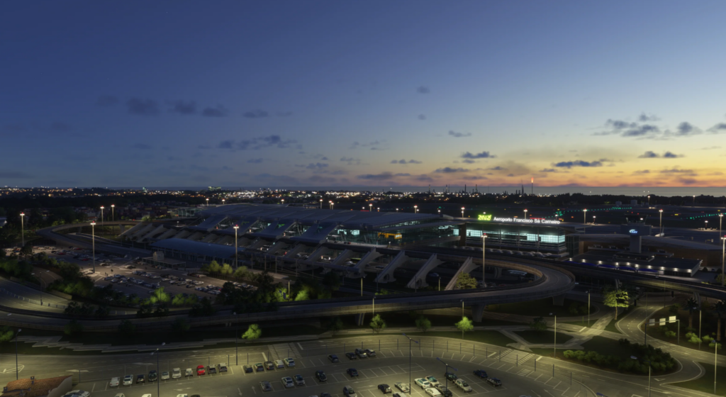 Terminal de l'aéroport de Porto la nuit avec un éclairage réaliste et des toits de la ville dans le décor MK Studios MSFS 2024