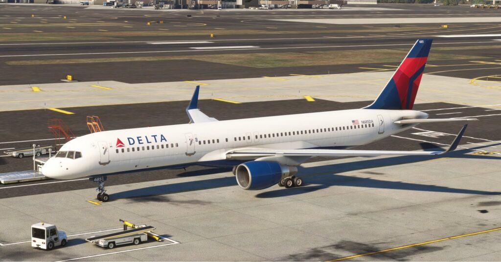 Un regard sur le BlueBird Delta 757, assis sur la rampe.